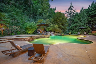 Gunite, heated pool with spa and waterfalls