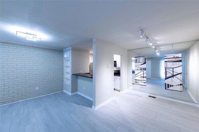 Unfurnished room featuring visible vents, baseboar