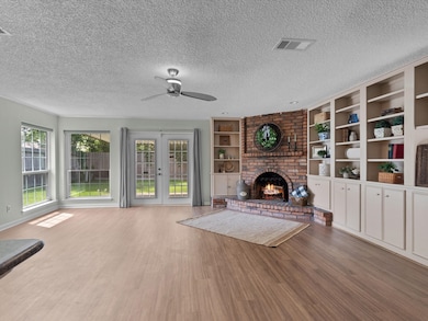 Enjoy this comfortable living area. Larg windows a