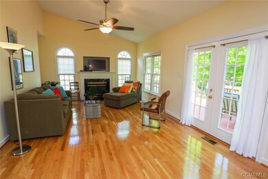 Bright and Sunny Open Floor Plan Family Room opens