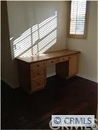 upstairs loft with built in desk