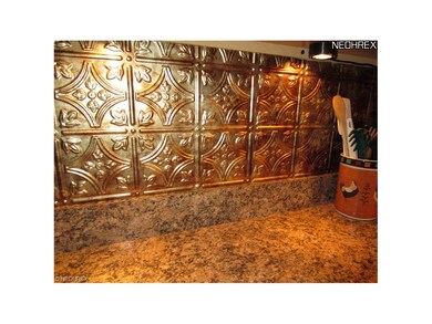 Beautiful Embossed Tin Backsplash Really Completes
