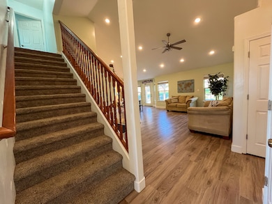 Staircase leading to upstairs bonus room
