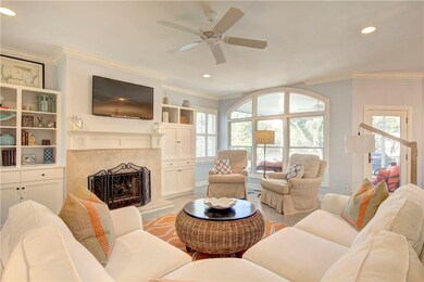 Gas fireplace flanked by built-ins in great room