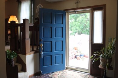 This front door and grand foyer say, 