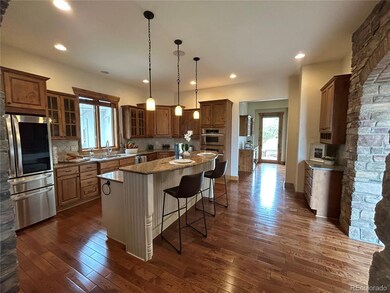 Custom built knotty cabinets with custom island
