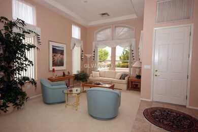 Living Room. OPEN AND AIRY LIVING ROOM WITH COFFER
