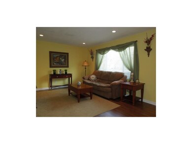 Large Living Room with new flooring and lighting w