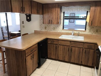 Kitchen features great counter space, plenty of ca