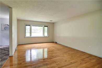Enter the home through the covered front porch and