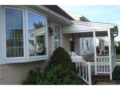 Exterior Front quaint front porch to relax and gre