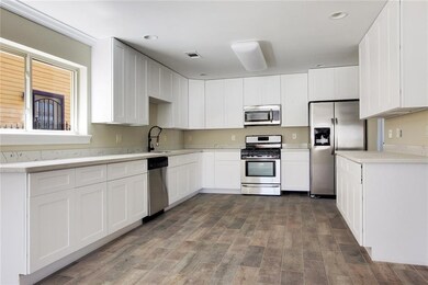 Kitchen with Shaker-Style Cabinets, Quartz Counter