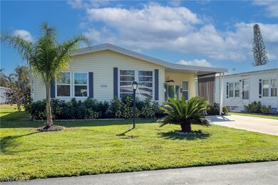 View of front of property with a front lawn
