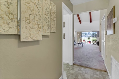 Standing in the Foyer, facing the Great Room.