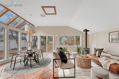 Sunny rear addition off the kitchen open to the la