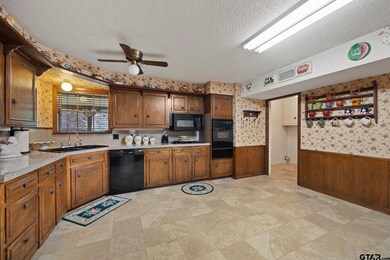Bright and spacious eat-in kitchen with gas range, separate oven, dishwasher & microwave