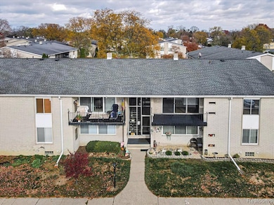 View of property with a residential view