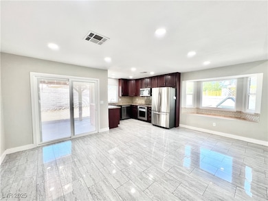 5828 Divers Cove Way, Las Vegas, NV 89108 - photo 4