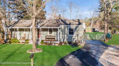 3. Front With Driveway