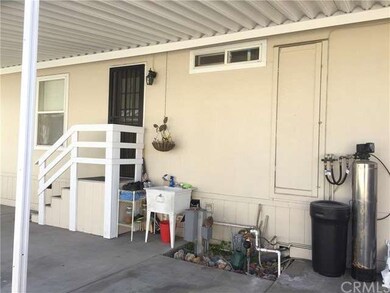 Extra Wide Carport Area; Water filtering system an