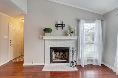 Marble tile surround make this fireplace a gorgeou