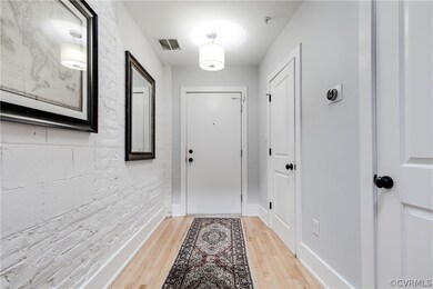 Foyer creates privacy and access to a Coat Closet