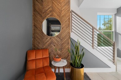 Living area featuring light tile patterned floorin