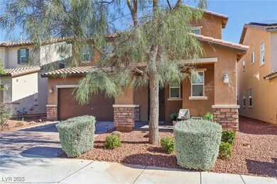 View of front facade featuring an attached garage,