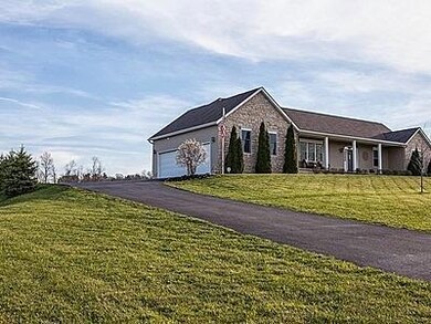 long driveway to side loading 3 car gara
