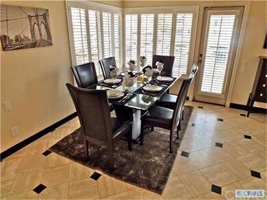 Formal dining room area with bay views