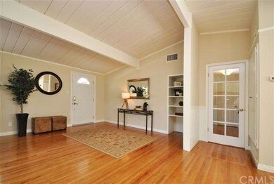 Vaulted Ceiling and Hardwood Floor throughout