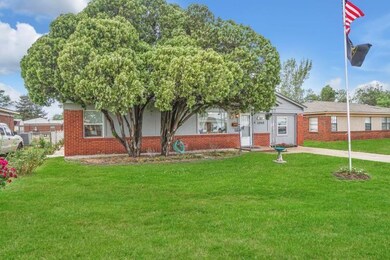 View of front of house featuring a front lawn