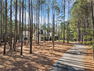 Surrounding community featuring driveway and a for