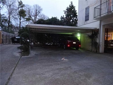 Parking Lot/Garage. Two parking spots for Unit 4D.