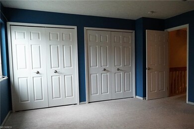 Multiple closets in the master bed room, with an a