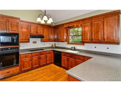 Beautiful kitchen with vaulted ceilings, hardwood 