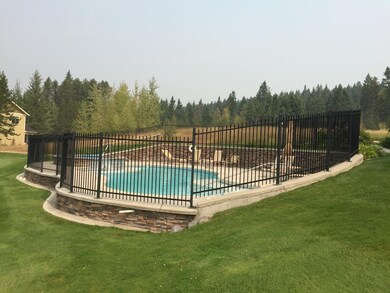 swimming pool across lawn