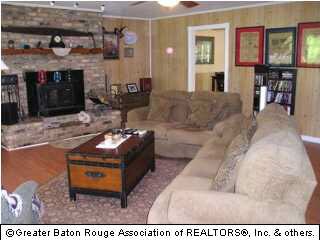 Living Room with heatilator fireplace.