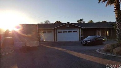 3 car garage with single drive thru dual doors for
