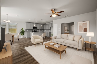 Open concept living room to kitchen * this photo i