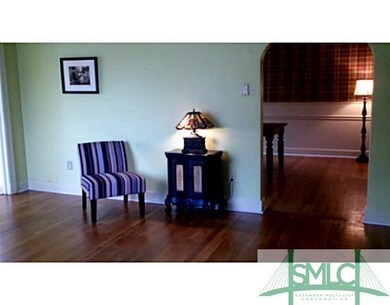 Living Room. Refinished Hardwood Floors.  High Cei