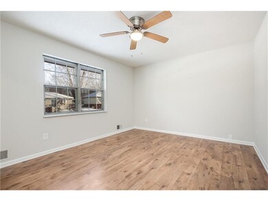 The living room is 14 x 11 with new paint, new lam
