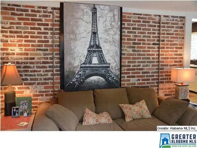Exposed brick wall in the BONUS room.