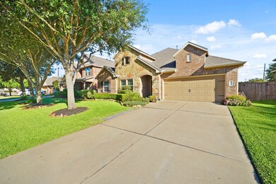 2-car garage with a long driveway.