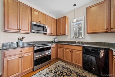 Granite counters and hardwood cabinets.