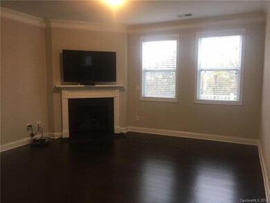 Great room with Gas Logs Fireplace and prefinished hard wood flooring.
