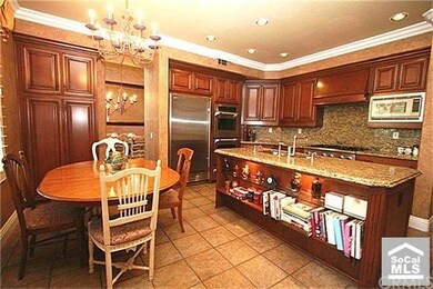 Gorgeous large granite center island with lighted 