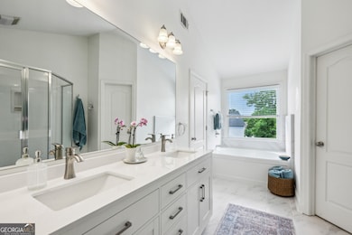 Updated Primary Ensuite With Dual Vanities, A Larg