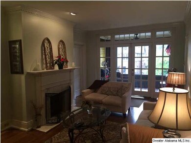 Elegant Interior.  Sun Room Beyond French Doors