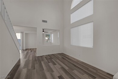 Unfurnished living room with visible vents, ceilin